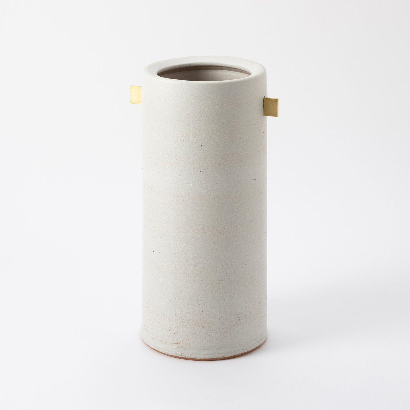 シンプルなホワイトカラーの陶器の傘立て